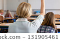Back view of older student raising his hand to answer teacher's question during education training class. jpg ai image 131905461