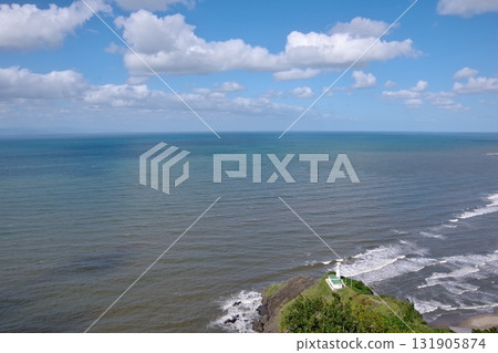 View of Cape Kakuda Lighthouse and the Sea of Japan from the hiking trail on Mount Kakuda in Niigata Prefecture View of Cape Kakuda Lighthouse and the Sea of Japan from the hiking trail on Mount Kakuda in Niigata Prefecture 131905874
