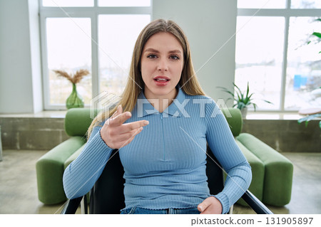 Web cam view of young woman talking looking in camera, online meeting, video call 131905897