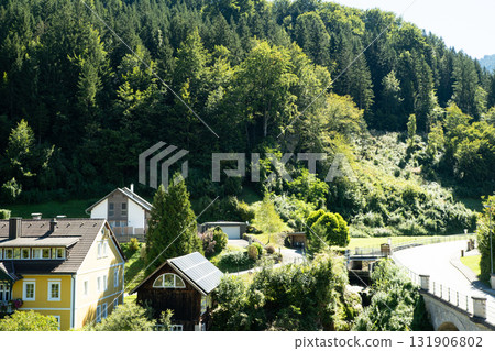 Austrian village in the mountains, beautiful views of the Alps Austrian village in the mountains, beautiful views of the Alps 131906802