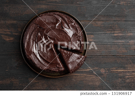 Chocolate brownie cake with rich chocolate topping Chocolate brownie cake with rich chocolate topping 131906917