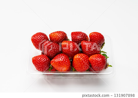 A transparent pack filled with fresh strawberries 131907898