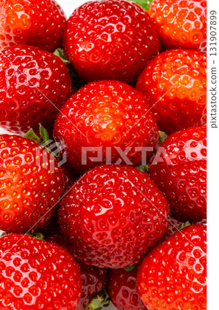 A transparent pack filled with fresh strawberries A transparent pack filled with fresh strawberries 131907899