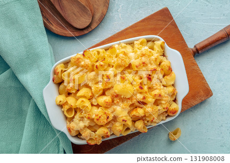 Mac and Cheese, macaroni pasta, oven-baked in a casserole with cream 131908008