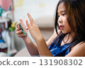 Child Playing Mobile Game on Smartphone at Home 131908302