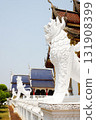 Plaster sculptures of lions is animals from literature decorate the cement fence in ancient pagoda of buddhism at Wat Den Sali Si Mueang Kaen temple. in Chiang Mai Province in Thailand 131908399