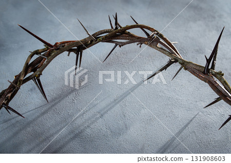 Jesus Crown of thorns shadow silhouette against textured gray surface, symbol spiritual pain and redemptive struggle Banner good friday concept Easter Christian background, Jesus Crown of thorns shadow silhouette against textured gray surface, symbol spiritual pain and redemptive struggle Banner good friday concept Easter Christian background, 131908603