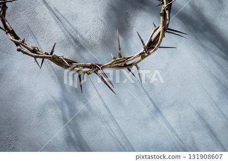 Jesus Crown of thorns shadow silhouette against textured gray surface, symbol spiritual pain and redemptive struggle Banner good friday for Christian concept Easter background, Jesus Crown of thorns shadow silhouette against textured gray surface, symbol spiritual pain and redemptive struggle Banner good friday for Christian concept Easter background, 131908607