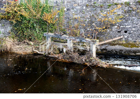 Old Wooden Sluice Remains Situated at the Allan Water Weir at Bridge of Allan in Stirlingshire Scotland Old Wooden Sluice Remains Situated at the Allan Water Weir at Bridge of Allan in Stirlingshire Scotland 131908706