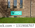 Try Praying Banner Hanging at an Urban Church Wall 131908707