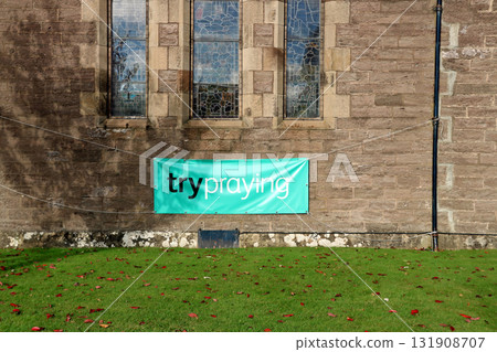 Try Praying Banner Hanging at an Urban Church Wall Try Praying Banner Hanging at an Urban Church Wall 131908707