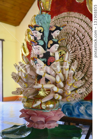 Sculpture of Avalokiteshvara, the Buddhist Bodhisattva of mercy with many handsin Chua Tu Van Pagoda 131908855