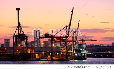 Gantry crane and sunset 131909273