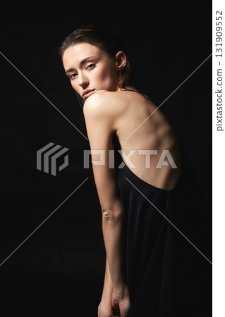 woman with wet Hair. Beautiful sexy model Girl in black Dress 131909552