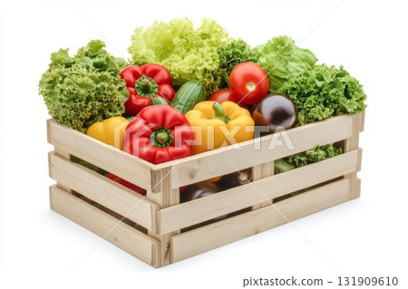 Fresh vegetables in wooden box. Healthy food on natural farm background. Harvested vegetables in a wooden crate on transparent background. Fruits and veggies. Organic produce and lush greenery. 131909610