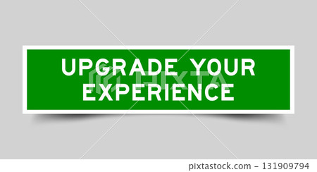 Green color square shape sticker label with word upgrade your experience on gray background Green color square shape sticker label with word upgrade your experience on gray background 131909794