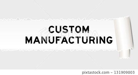 Ripped gray paper background that have word custom manufacturing under torn part Ripped gray paper background that have word custom manufacturing under torn part 131909803