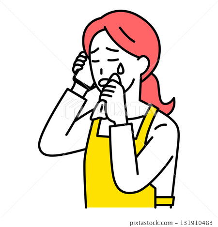 A woman in an apron crying while talking on a smartphone A woman in an apron crying while talking on a smartphone 131910483