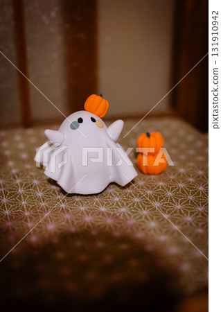 Colorful Halloween ghosts and pumpkins Colorful Halloween ghosts and pumpkins 131910942