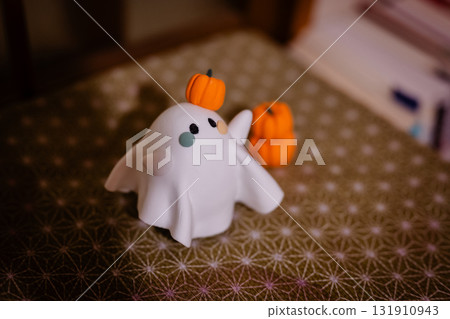 Colorful Halloween ghosts and pumpkins 131910943