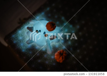 Colorful Halloween ghosts and pumpkins 131911058