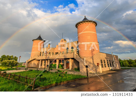 A rainbow shining in the Okhotsk sky and a brick castle 131911433