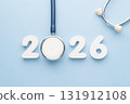 Stethoscope with 2026 number on blue background. Happy New Year for health care and medical banner calendar cover. Creative idea for new trend in medicine treatment and diagnosis concept. 131912108