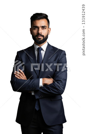 A South Asian businessman, standing confidently with arms crossed, his gaze firm and thoughtful, symbolizing the strength, intelligence, and leadership 131912439