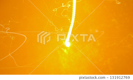 Abstract Light Trails on Orange Background - Long Exposure Motion 131912769