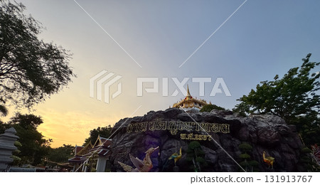 Golden Mount Wat Saket Temple in Bangkok during the annual temple fair translate Thai language to English is Golden Mount Temple Fair B.E.2567 131913767