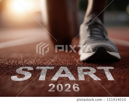 New year 2026 begins with runner on track, symbolizing fresh starts and determination for future goals 131914010