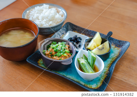 A healthy Japanese breakfast of natto, miso soup, okra, and fruit A healthy Japanese breakfast of natto, miso soup, okra, and fruit 131914382