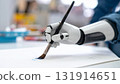 A futuristic art scene where androids hold brushes and create art 2 131914651