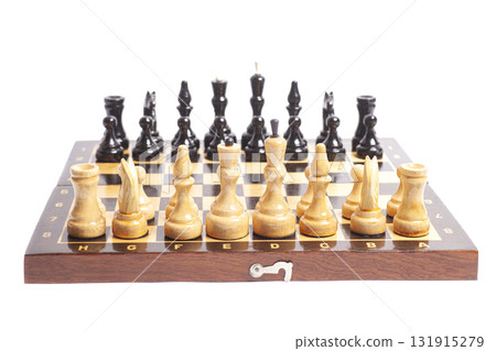 Chess board with chess pieces isolated on white Chess board with chess pieces isolated on white 131915279