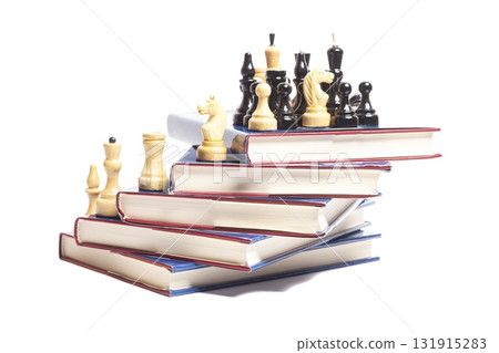 Chess on stack of books 131915283