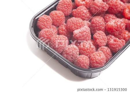 Fresh ripe raspberries isolated on white background Fresh ripe raspberries isolated on white background 131915300