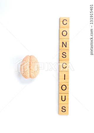 Conscious Mind Concept with Brain and Wooden Letter Tiles Conscious Mind Concept with Brain and Wooden Letter Tiles 131915401