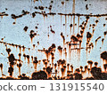 old rusty metal surface with peeling paint 131915540