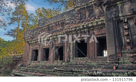 Moss covered ancient temple ruins Angkor Wat Cambodia Moss covered ancient temple ruins Angkor Wat Cambodia 131915796