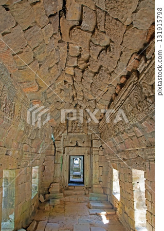 Interior stone corridor in ancient Angkor Wat temple Cambodia Interior stone corridor in ancient Angkor Wat temple Cambodia 131915798