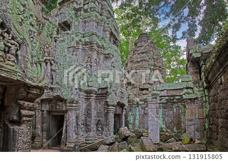 Moss covered ancient temple ruins Angkor Wat Cambodia Moss covered ancient temple ruins Angkor Wat Cambodia 131915805
