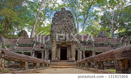 Ancient temple ruins with trees Angkor Wat Cambodia 131915808
