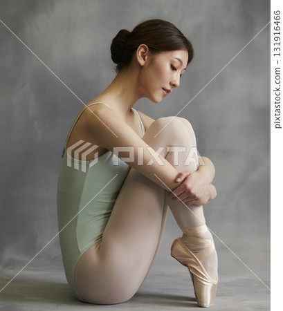 Woman in a green leotard 131916466