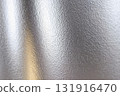 Shiny silver surface with a lot of texture 131916470
