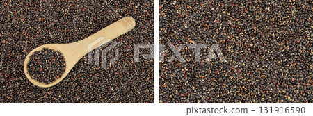 black quinoa in wooden spoon as a background. Top view. Flat lay 131916590