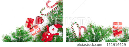 Christmas Frame of Fir tree branch with candy canes and snow isolated on white background with copy space for your text Christmas Frame of Fir tree branch with candy canes and snow isolated on white background with copy space for your text 131916629