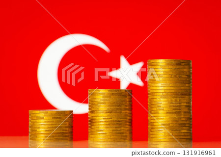 Upcoming graph made of golden coins on the background of flag of Turkey. Concept of development, growth, economic progress of Turkey 131916961