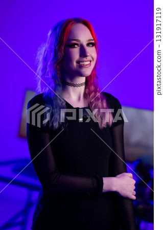 Young woman with colorful hair in creative studio atmosphere Young woman with colorful hair in creative studio atmosphere 131917119