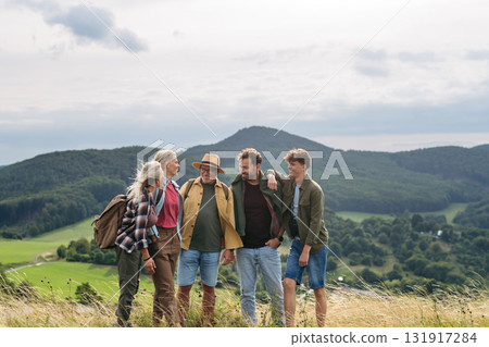 Multigenerational family on hiking trip in nature. Multigenerational family on hiking trip in nature. 131917284