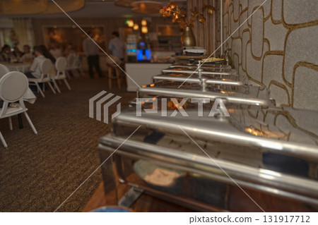 Selective focus. Row of Chafing Dishes at Event Buffet 131917712